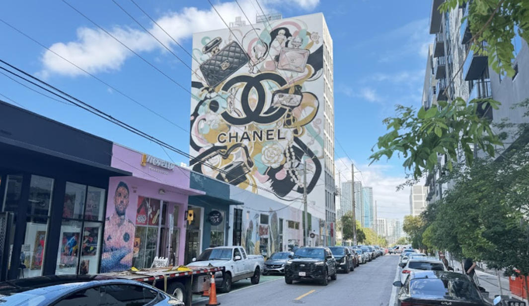 Chanel mural covering a building wall